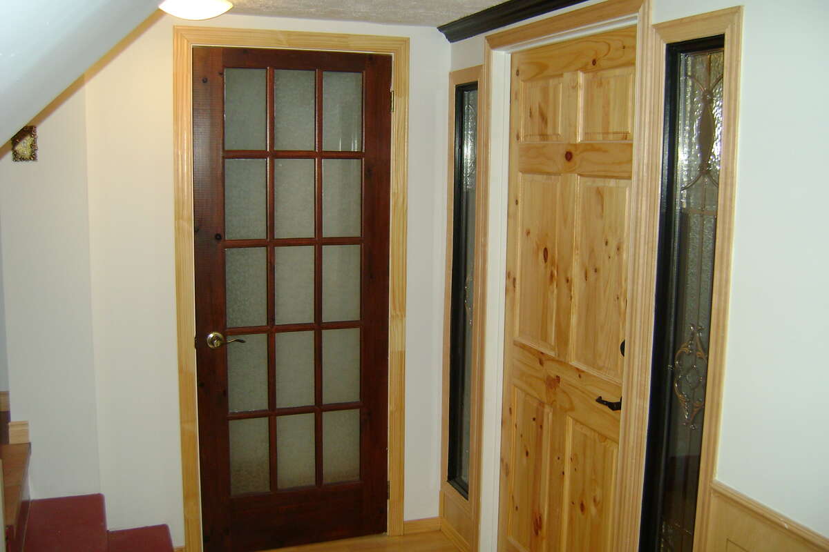 External entrance to basement washroom and main studio entrance