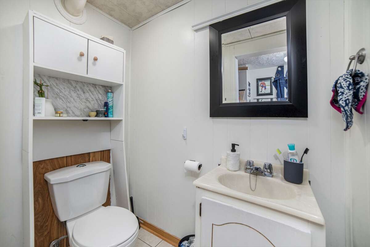 Entrance to basement washroom (There is a large storage area that does not appear on the pictures for towels and drugstore products)