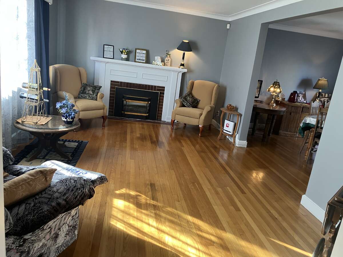 Open concept Living & Dining Rooms with Gas Fireplace