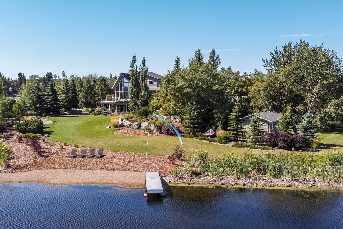 Acreage / Home-Based Business Potential / Island with Building(s) / Land with Building(s) / Waterfront Property For Sale in Edmonton, AB - 6 bed, 3 bath