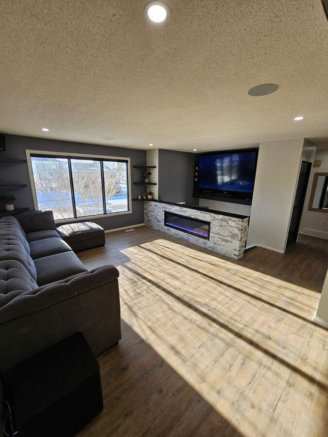 Living Room with built in Tv & Surround Sound