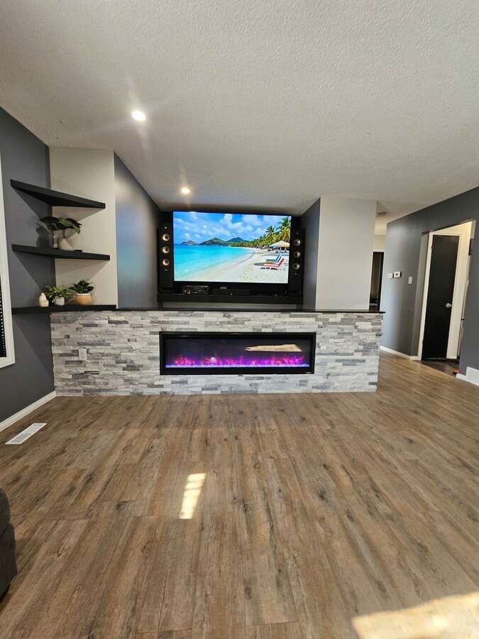 Living Room with built in Tv & Surround Sound