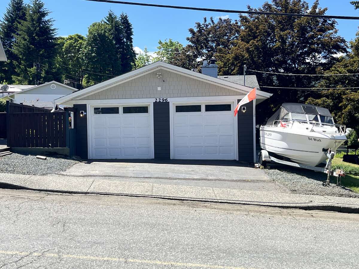 Double garage, lots of additional driveway parking.  Looking south toward the house.
