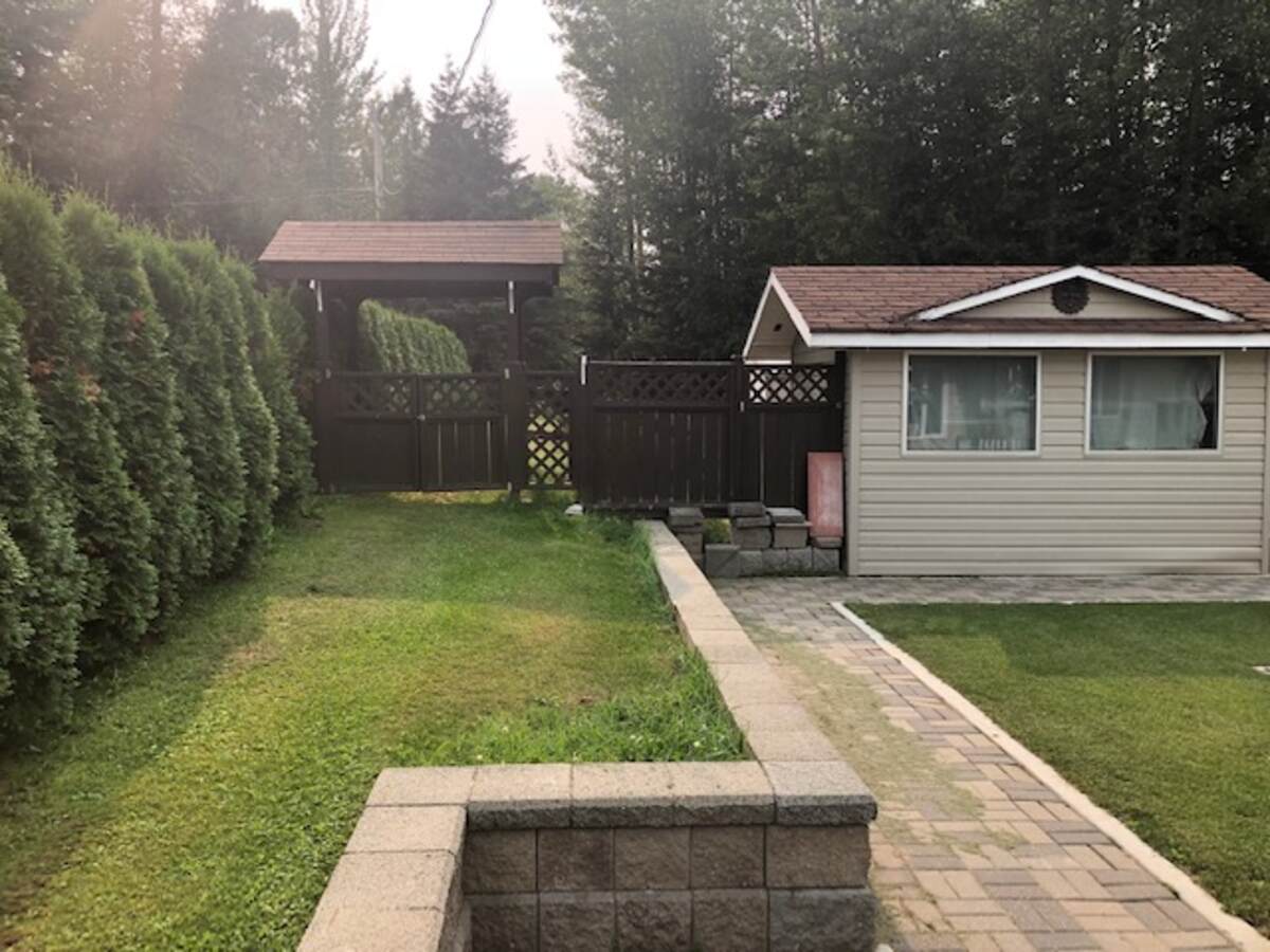 Left side property Looking towards front gate