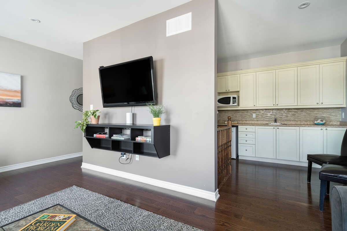 Third level Family Room with Balcony, Kitchenette