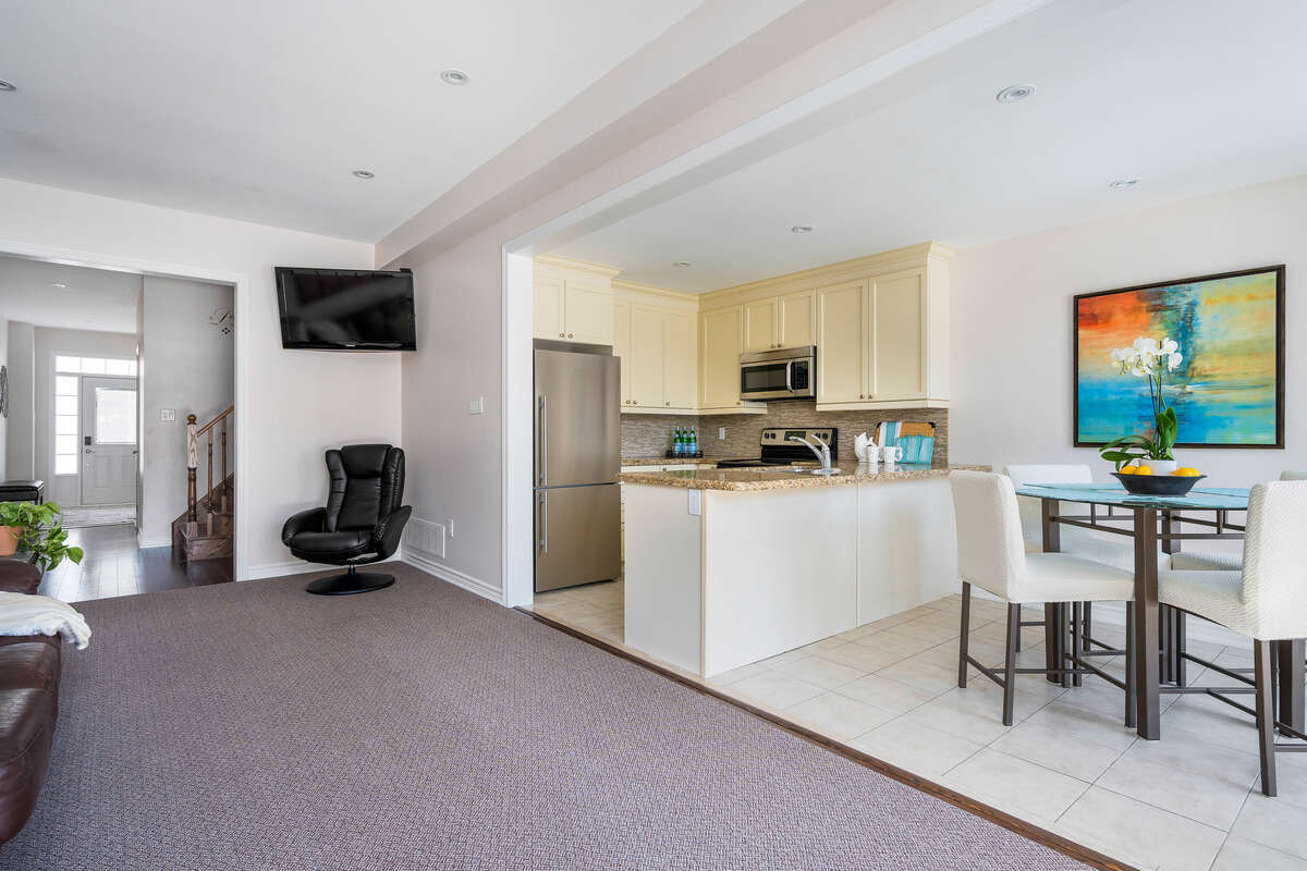 Main level living area, kitchen, dining area