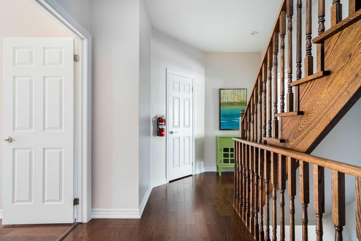 Second level hall to bedrooms,4 piece bathroom, and linen closet