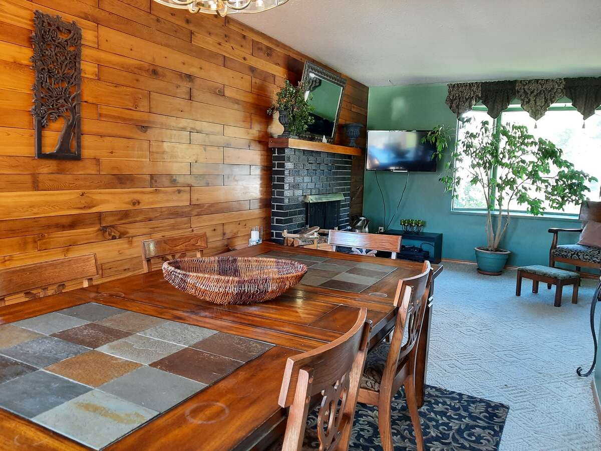 Gorgeous original feature wall with brick fireplace