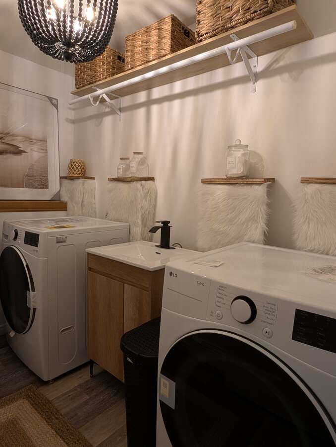 Dreamy laundry room with brand new washer and dryer