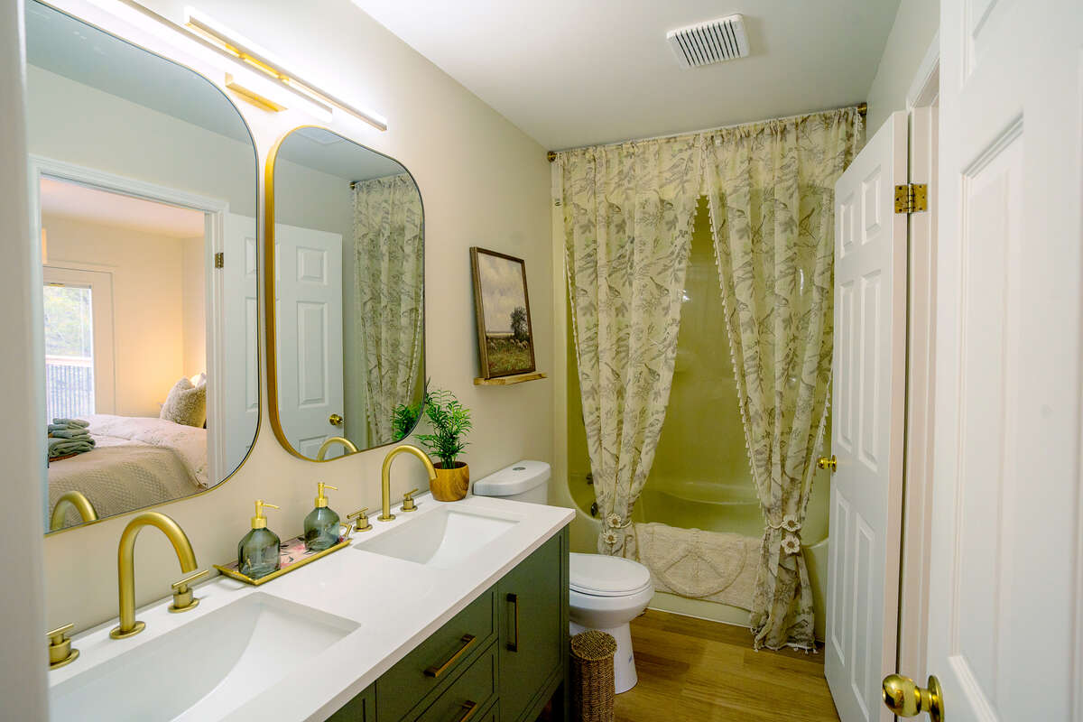 Beautiful brand new double sink stone vanity, taps, lighting, mirrors