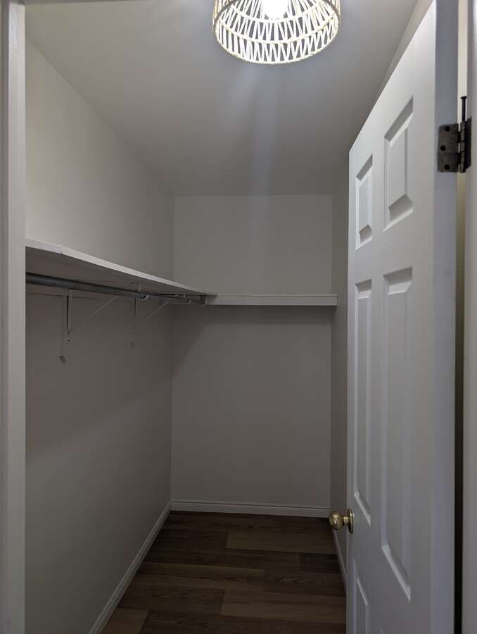 Extra large walk in closet in master bedroom