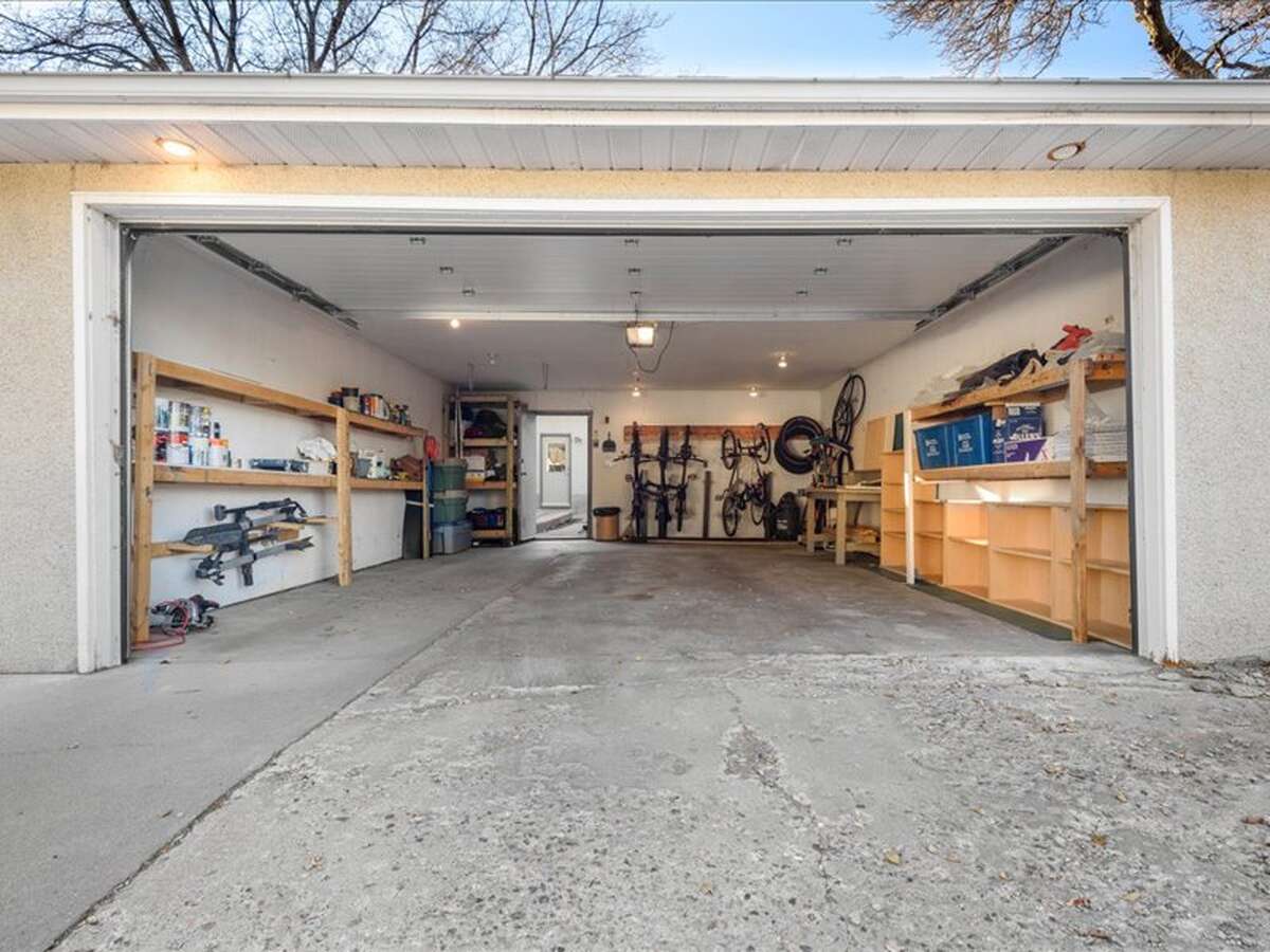 2 Car, Insulated, Electrified Garage: 25' L x 19' 5" W