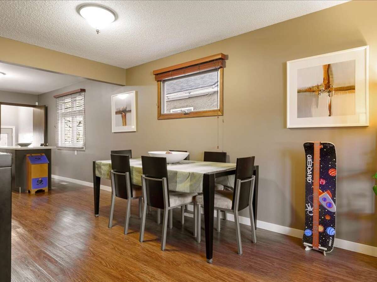 Open Concept: Living Room, Dining Room, Kitchen | Vinyl Plank Flooring