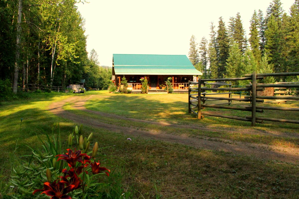 Driveway entrance with crown land on right side