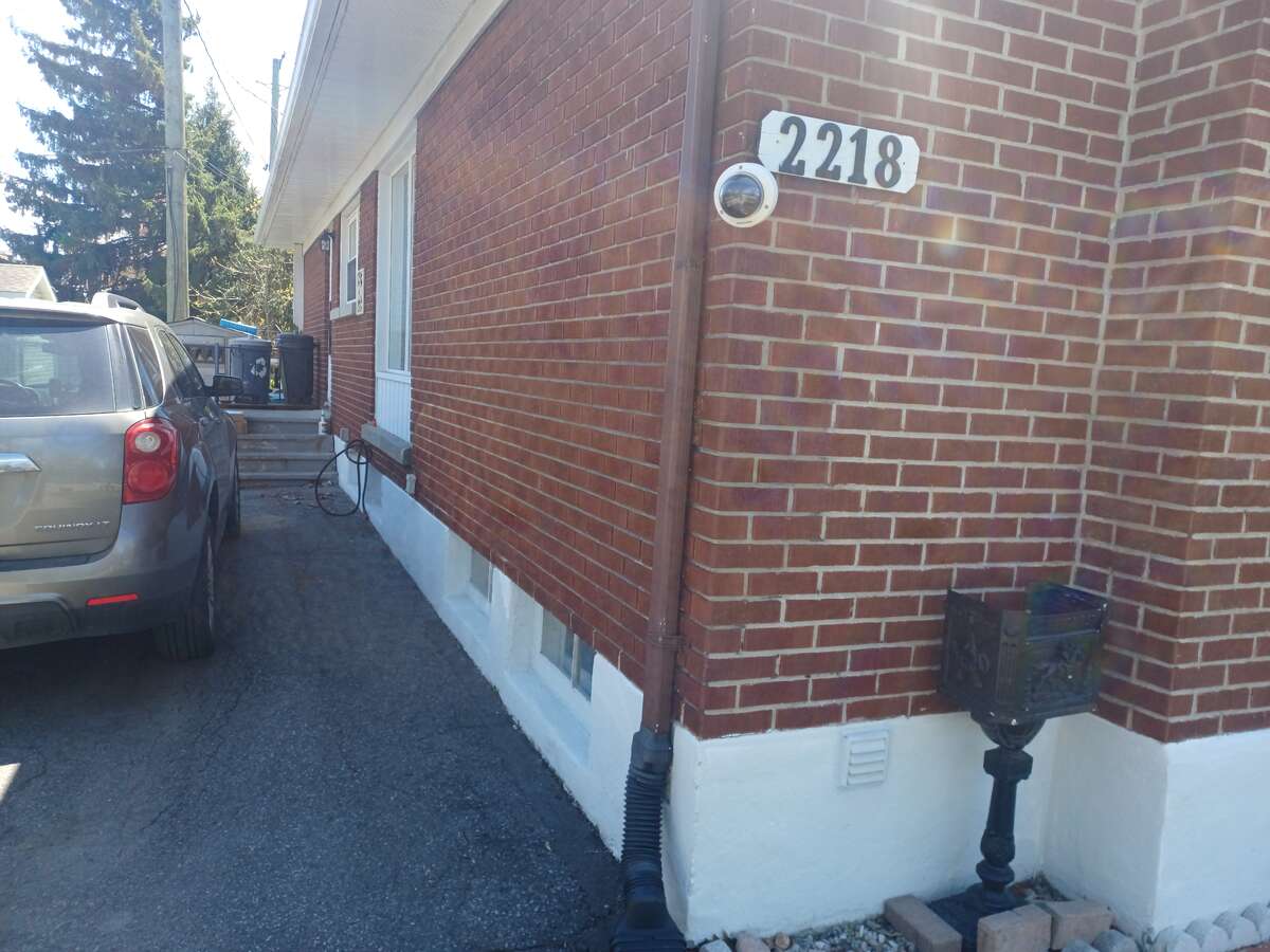 side entrance goes to basement