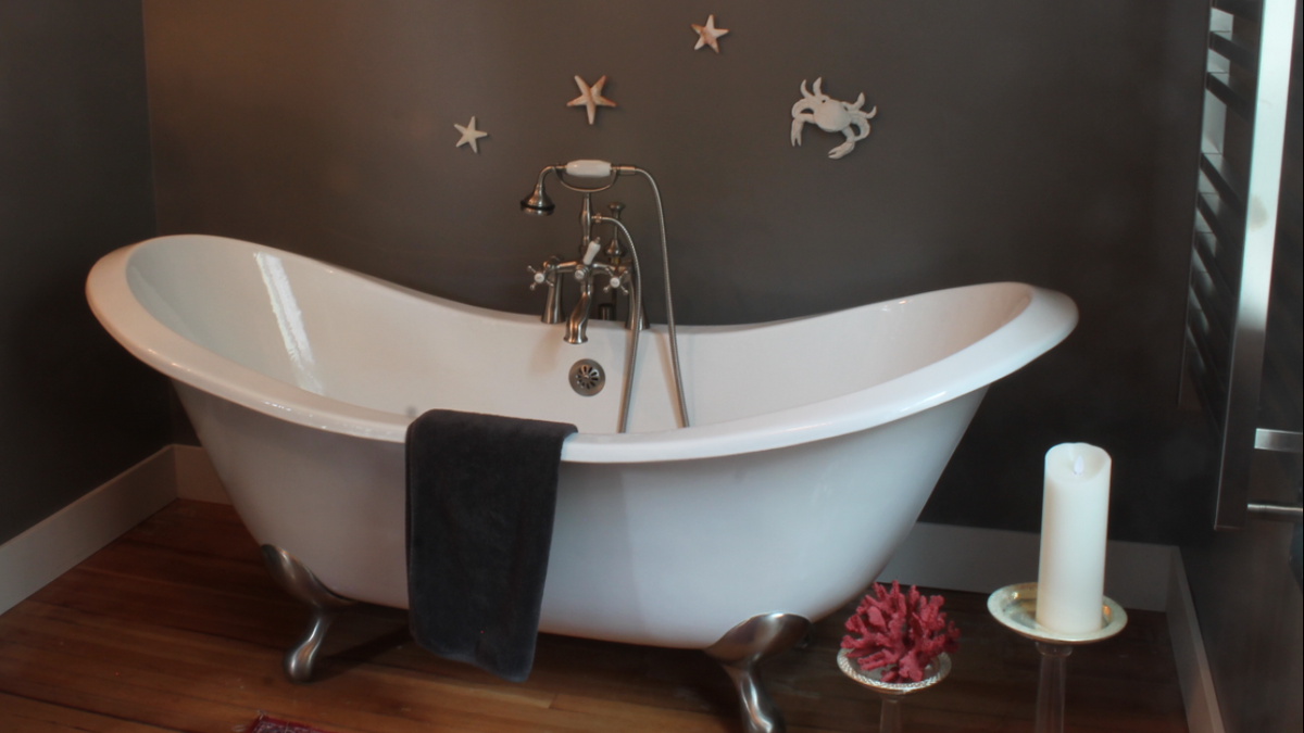 Top floor bathroom, claw tub and towel warmer