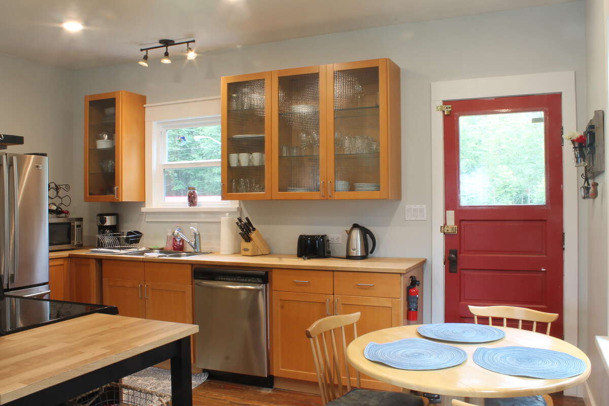 Kitchen on 2nd floor, door to back covered deck