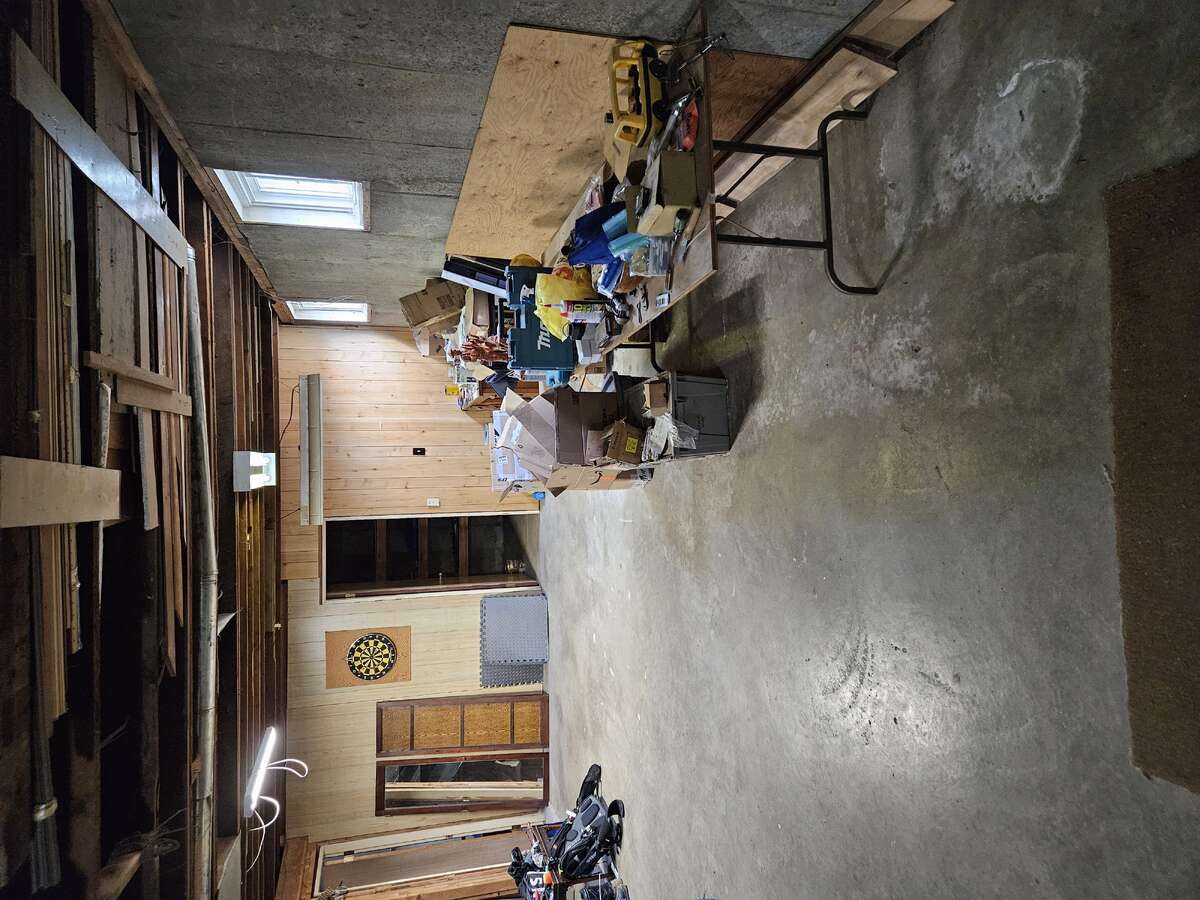 Basement - storage and bedroom entry at back