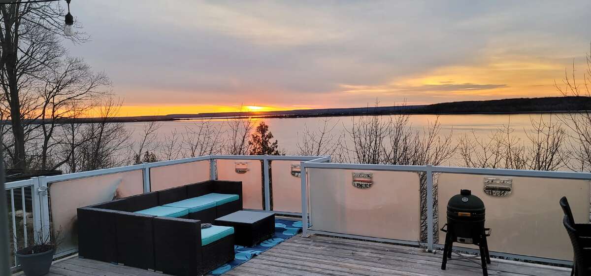 From patio over bluff to lakeside view
