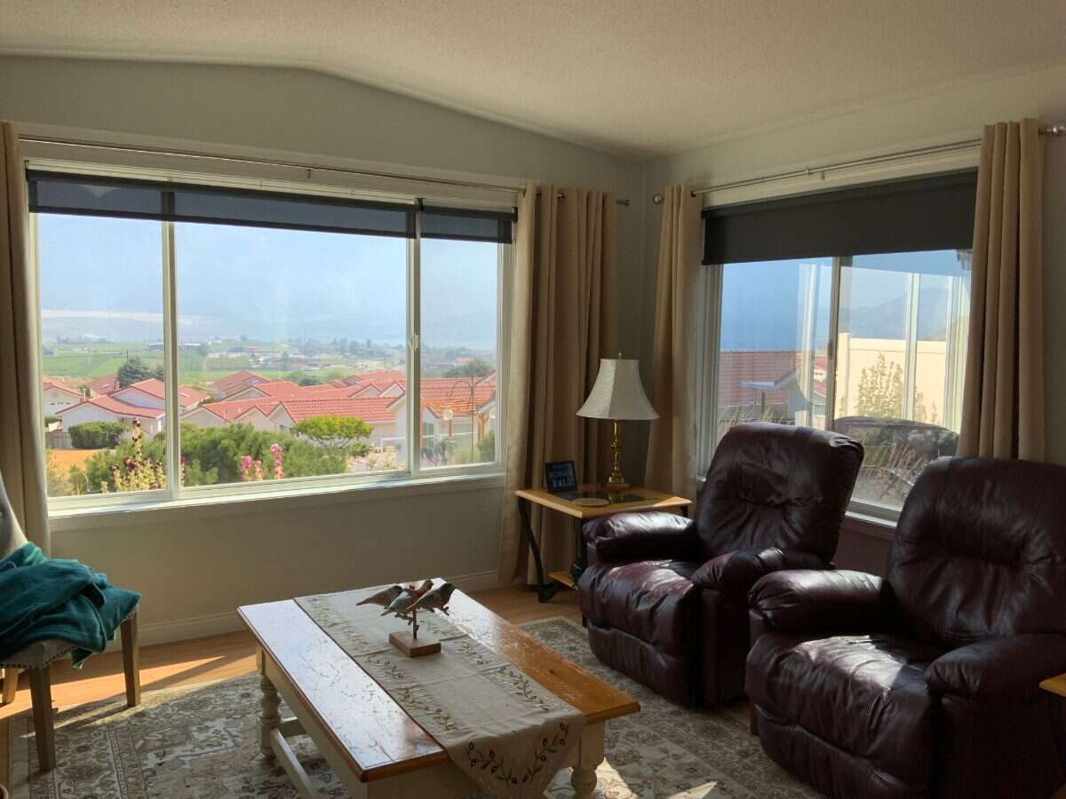 Lovely rancher with spectacular views .