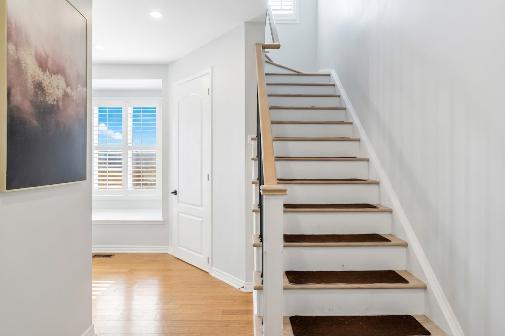 Powder room on the main floor with toilet seat.