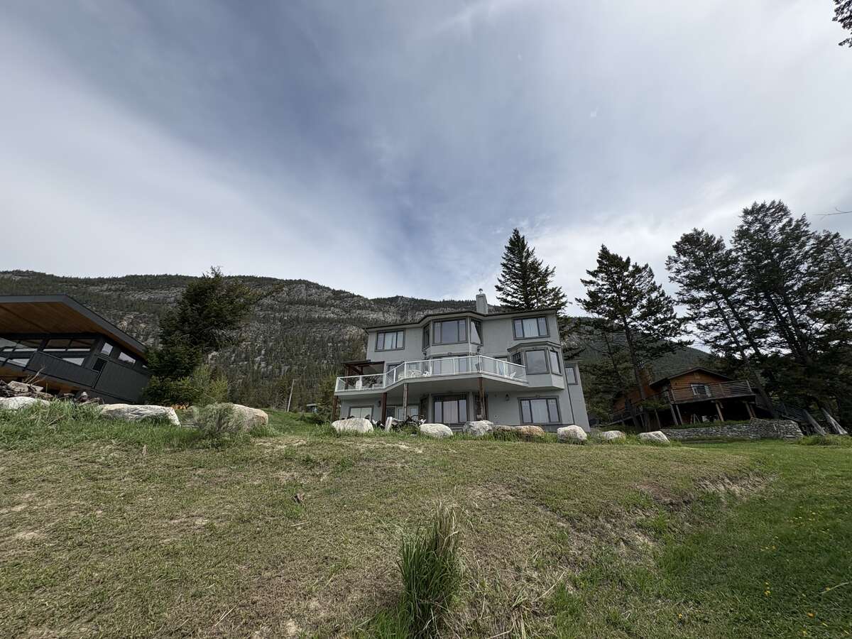 Looking up to house from lake