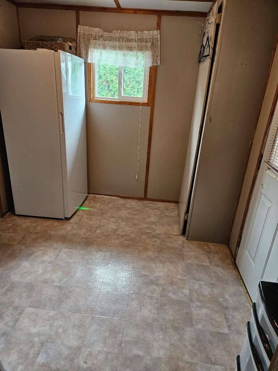  Security & Comfort in this Upgraded Mftd. Home