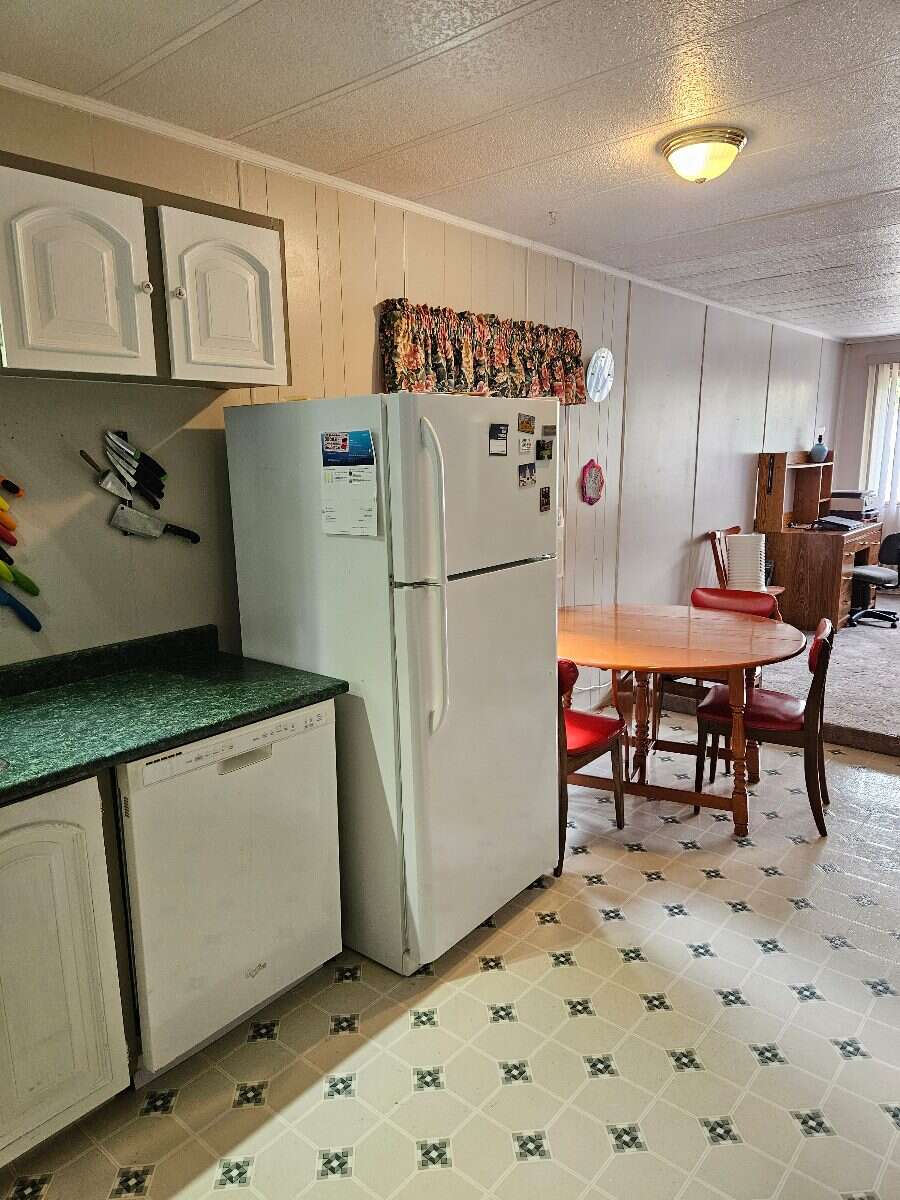 Security & Comfort in this Upgraded Mftd. Home