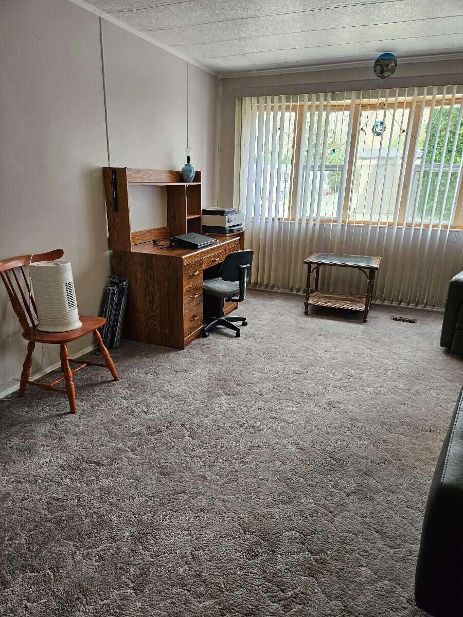  Security & Comfort in this Upgraded Mftd. Home