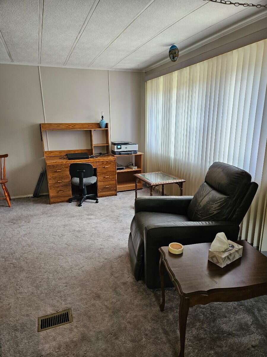  Security & Comfort in this Upgraded Mftd. Home