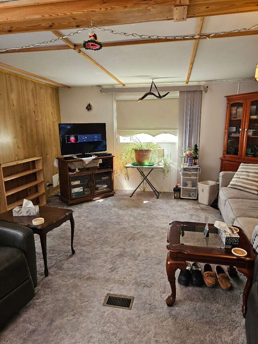  Security & Comfort in this Upgraded Mftd. Home