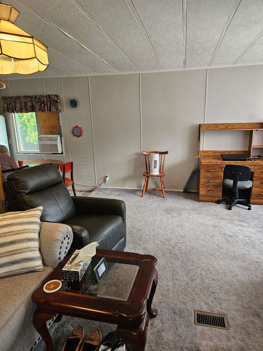  Security & Comfort in this Upgraded Mftd. Home