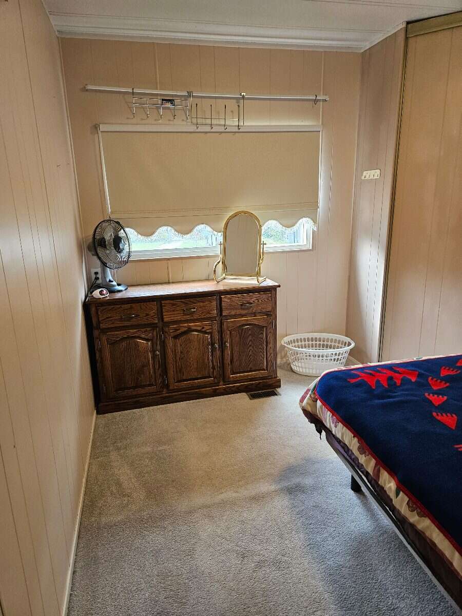  Security & Comfort in this Upgraded Mftd. Home