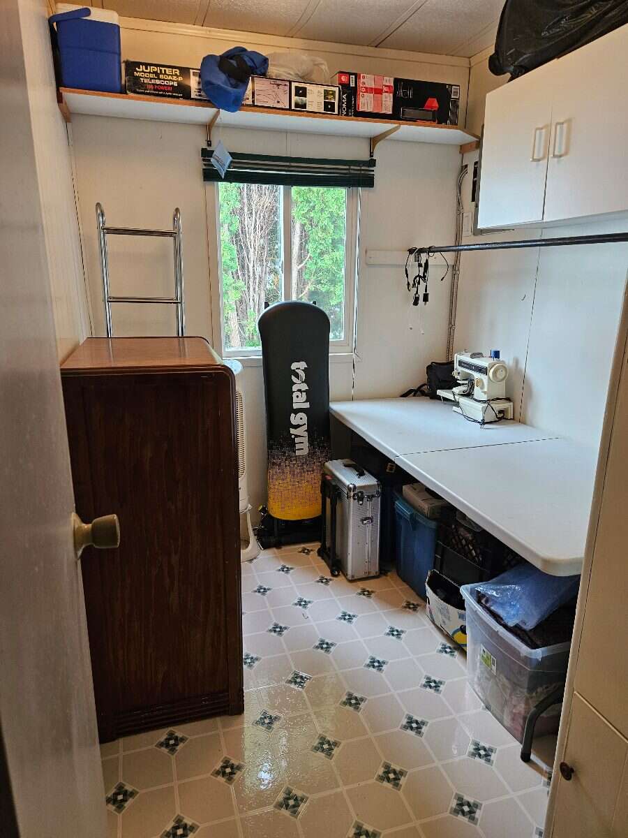  Security & Comfort in this Upgraded Mftd. Home
