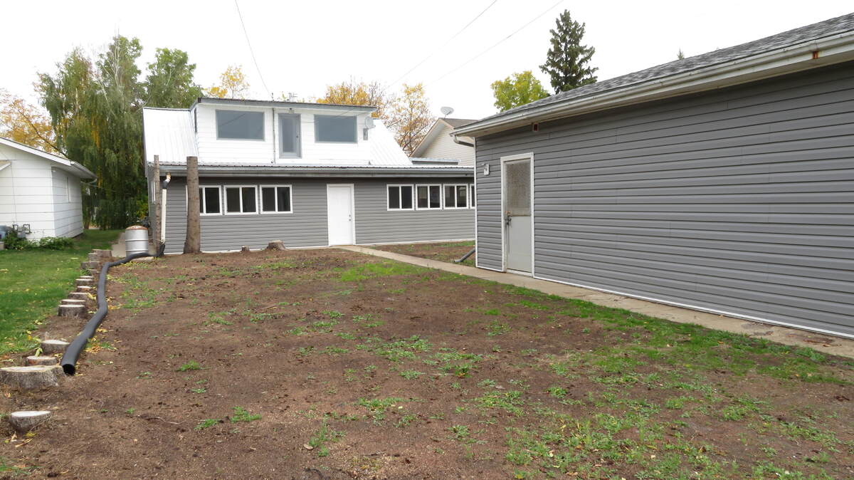 Rear Alley way view. Large Garden areas