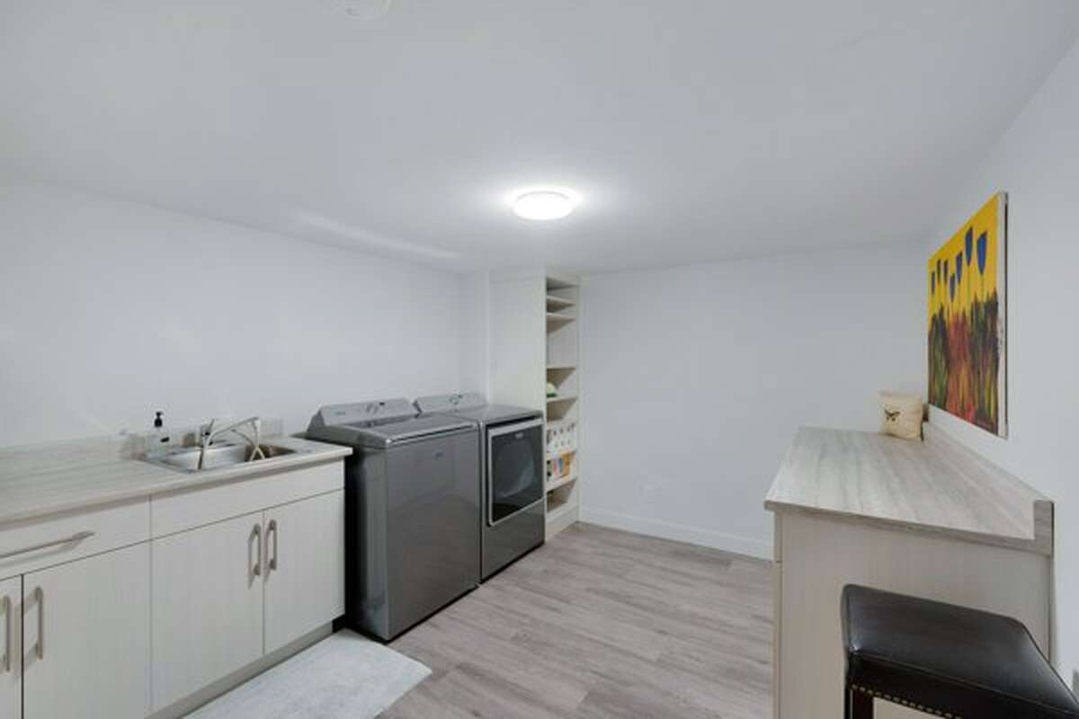 Huge Laundry Room ~ Tones of Storage and Cabinets