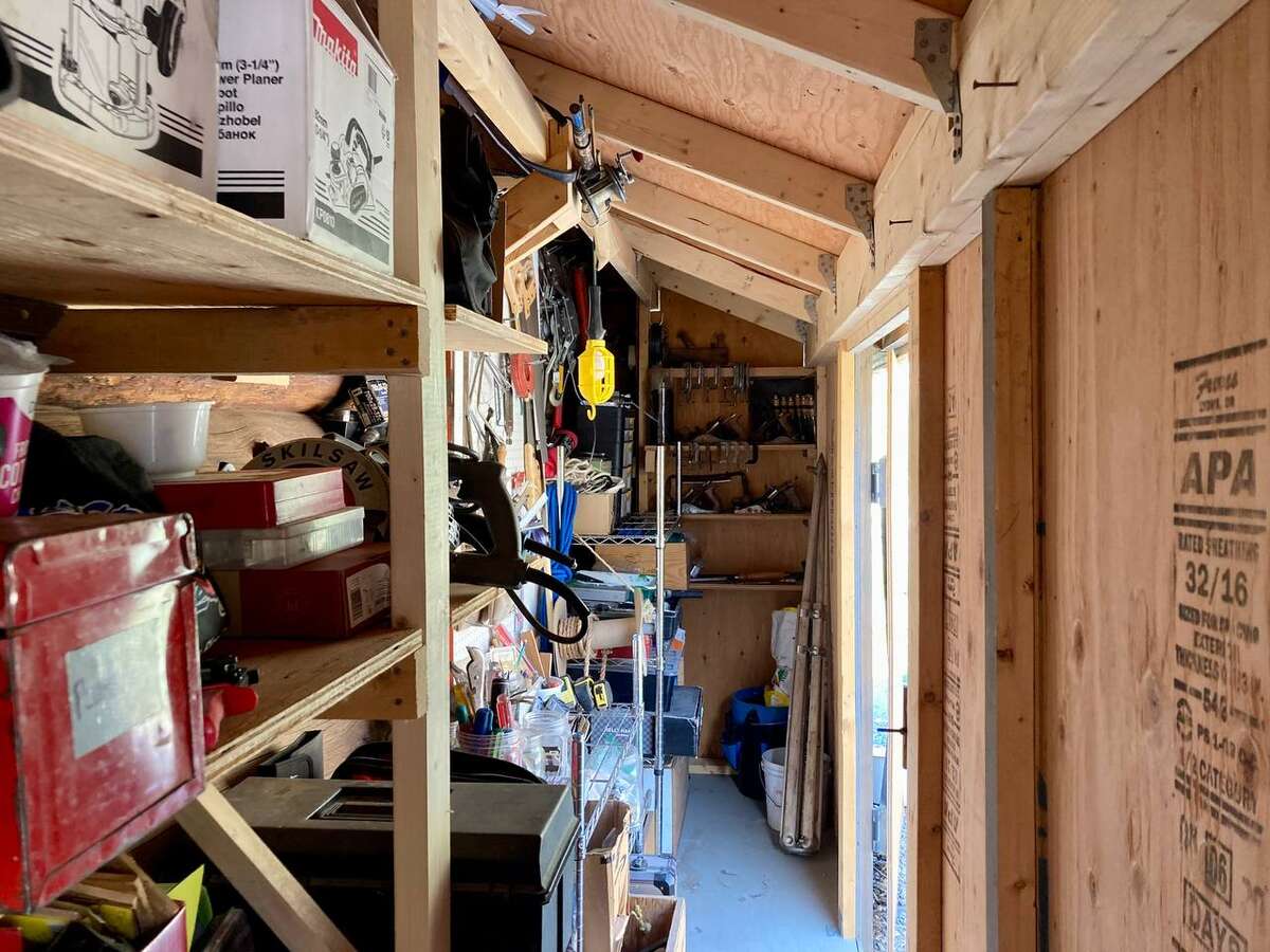 Some of the 140 ft2 of exterior storage sheds attached to main house.