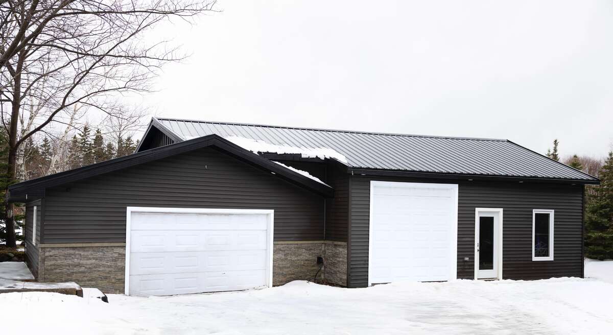 Garage with large newly finished addition