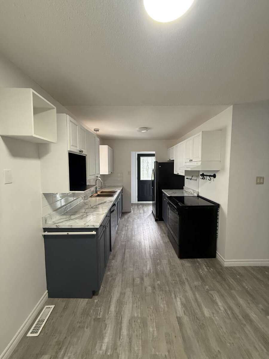Detached Home with private backyard
