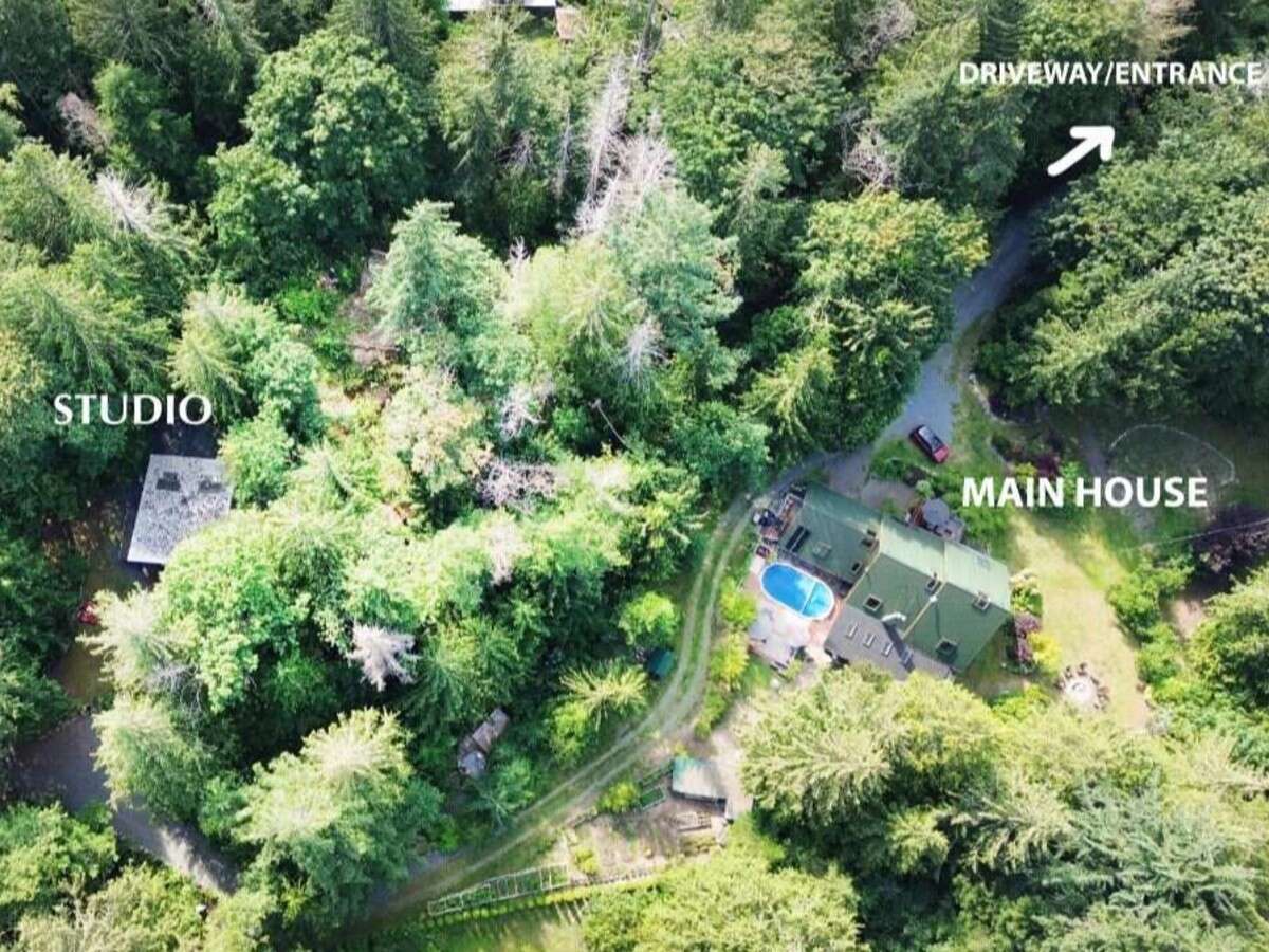 Private 4.3 Acre Forest Home with Studio & Cabins