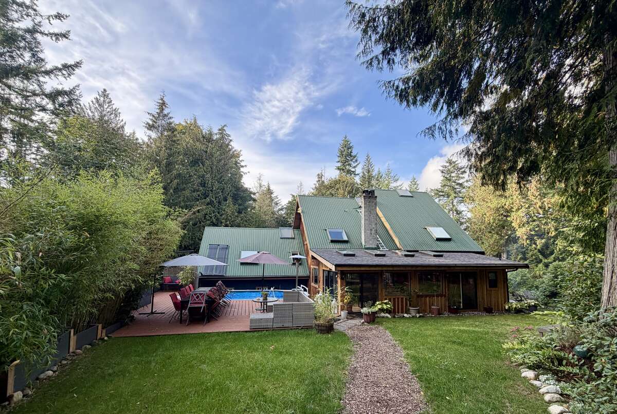 View of the Back of the Home, Large Sunny Deck and Pool