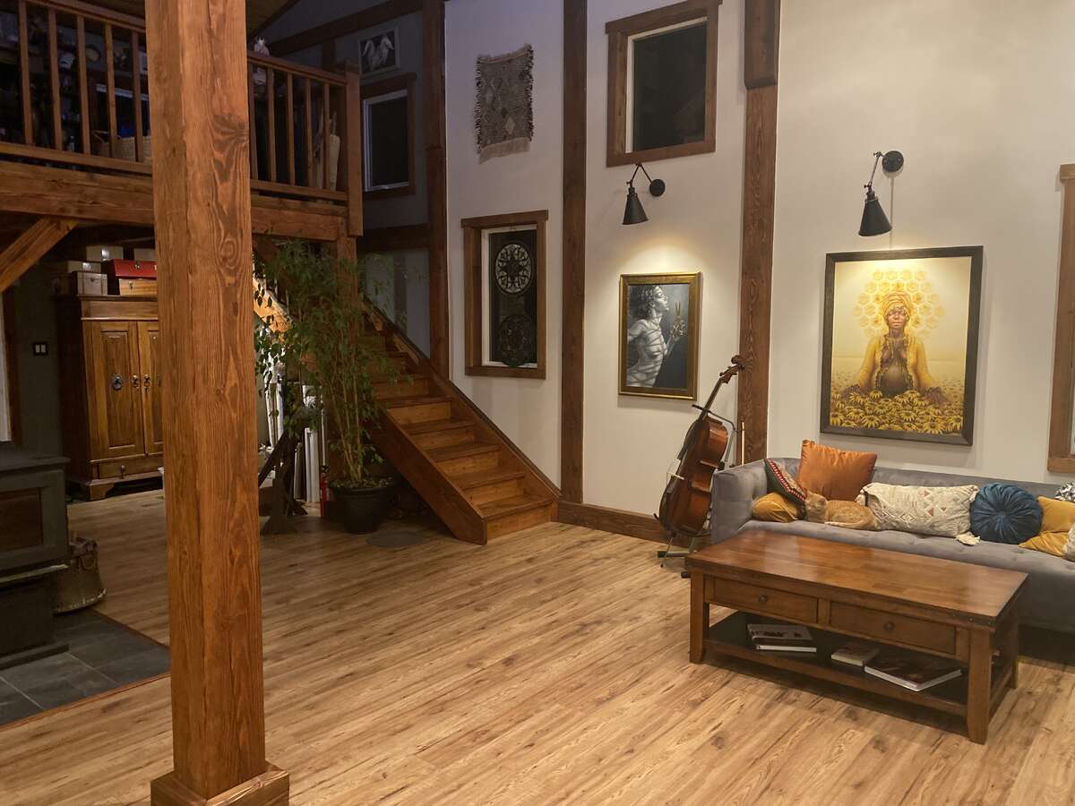 Studio with WETT Certified Stove and Steps to Mezzanine