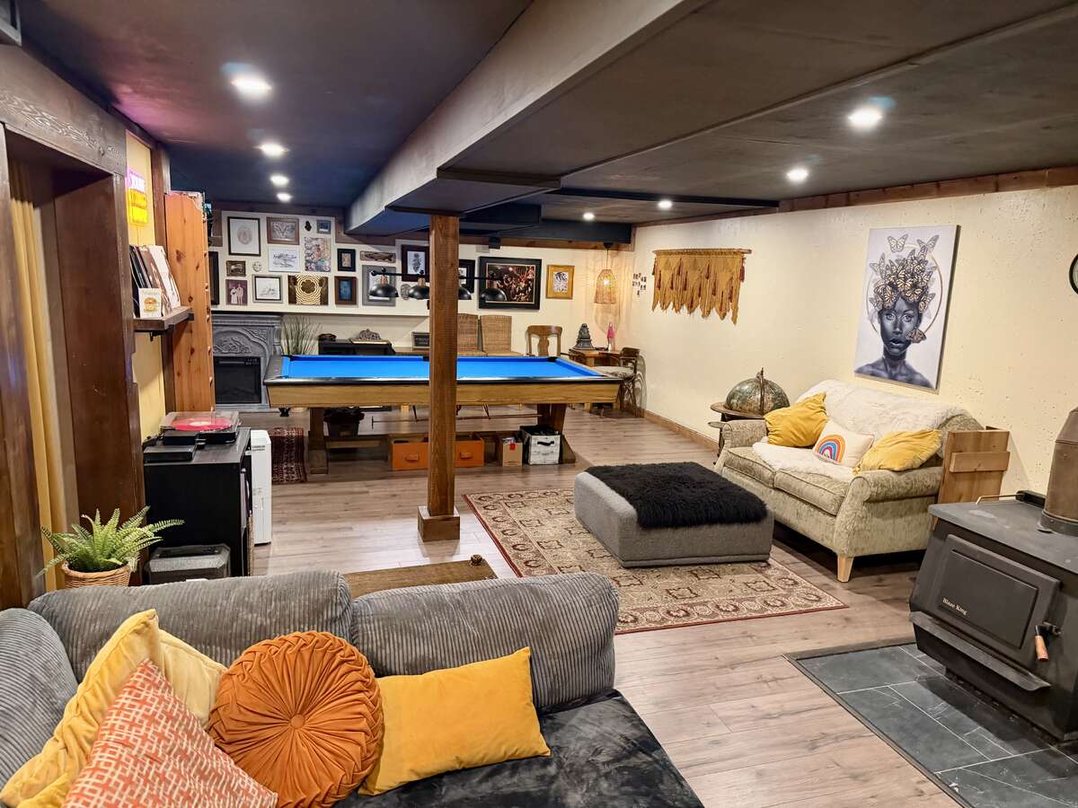 Converted Basement with WETT Certified Blaze King Wood Stove