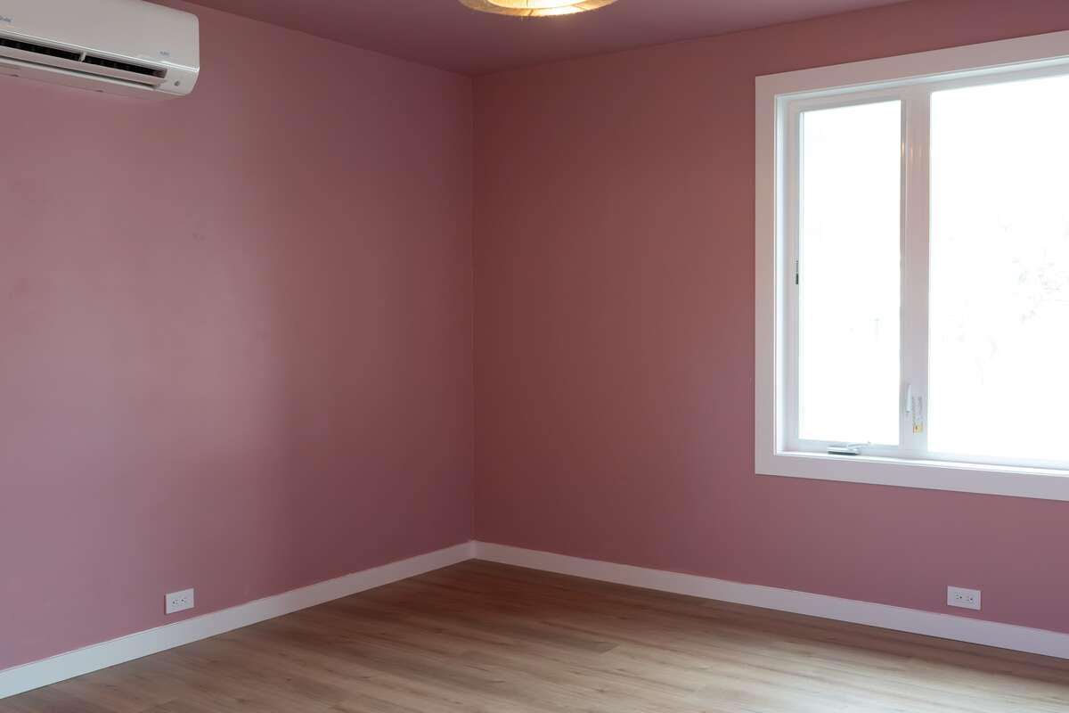 One of two bedrooms, new windows, heat pump/AC and closet space