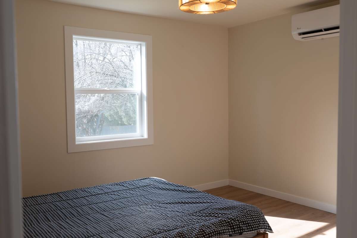 One of two bedrooms, new windows, heat pump/AC and closet space