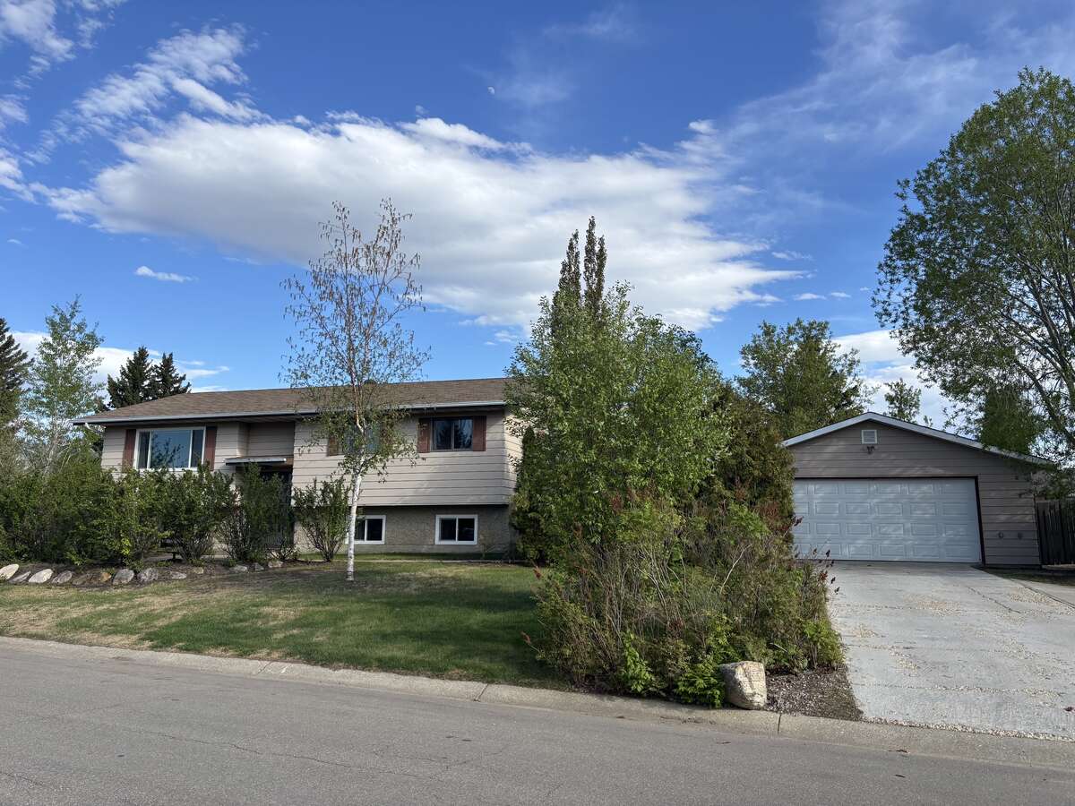 Updated Comfort on a Prime Corner Lot!