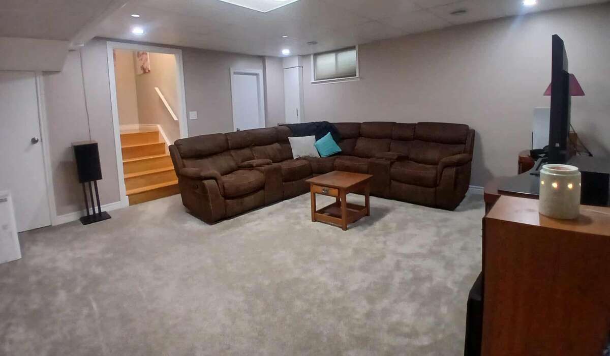 Carpeted, spaceous living room