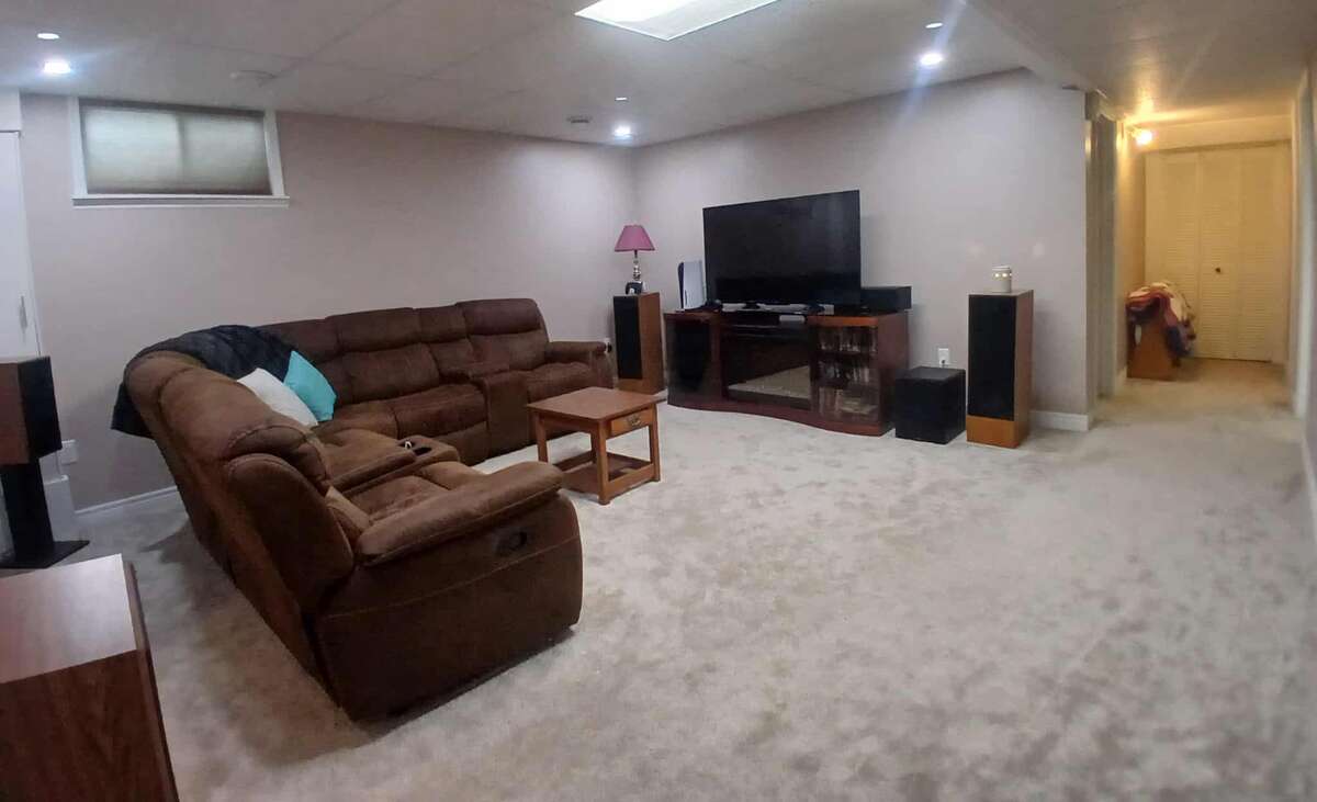 Carpeted, spaceous living room