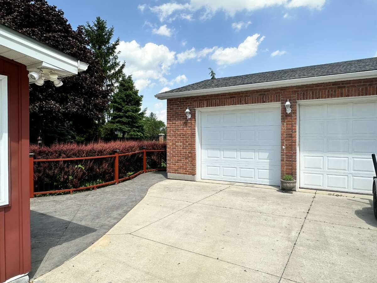 Large garage and cement driveway - garage fridge included