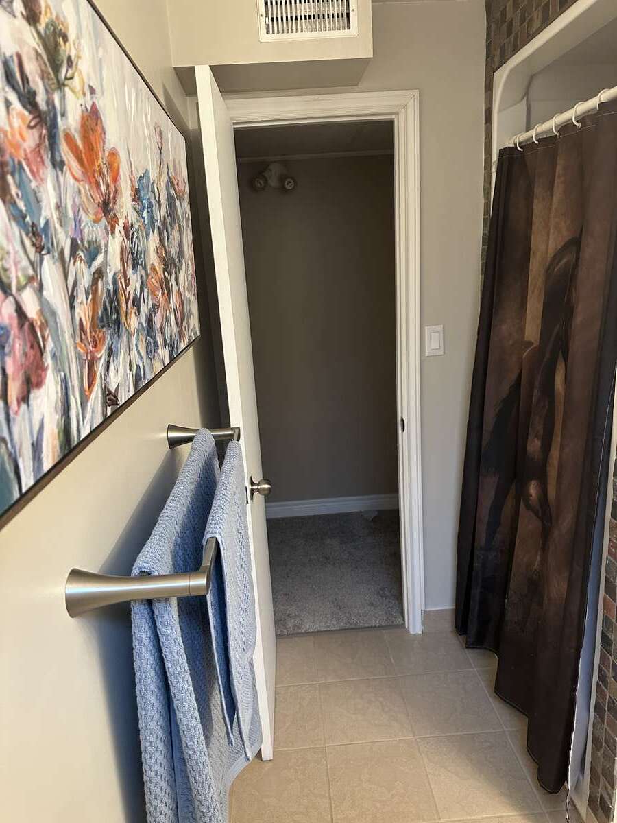 Carpeted, spaceous living room